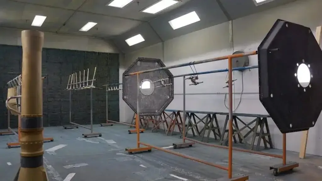 Custom machine frames and fixtures in the Astro paint and finishing room